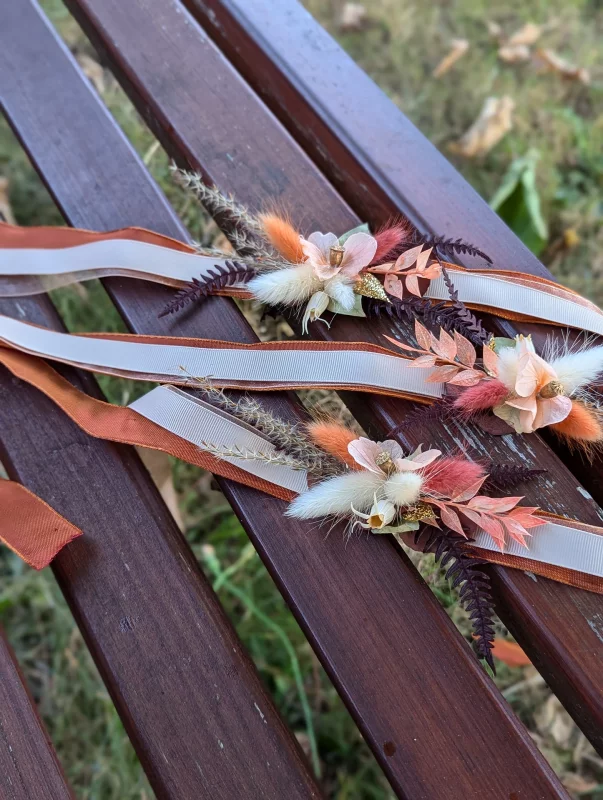 Stephanie's bridal floral bracelet, bohemian style with peach dried flowers and terracotta ribbons, Manoir Saint Gervais.