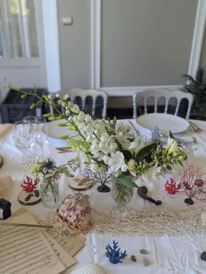 Sophisticated Rustic Table Centrepiece with white lisianthus, thistles and foliage, nautical theme, wedding.