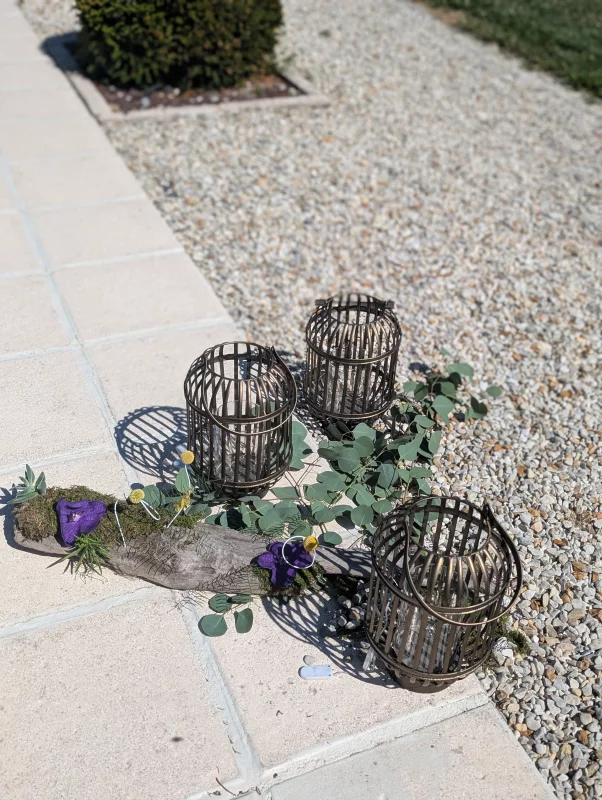 Sophisticated country garden composition with eucalyptus and purple blooms, outdoor decor, wedding.