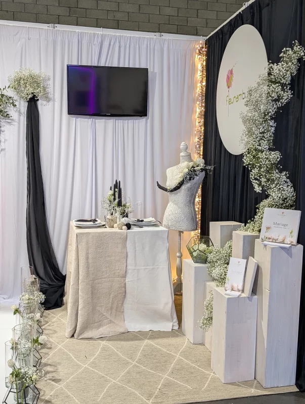 Contemporary botanical styling featuring spiralling white gypsophila and elegant table arrangements for the 2024 Wedding Fair.